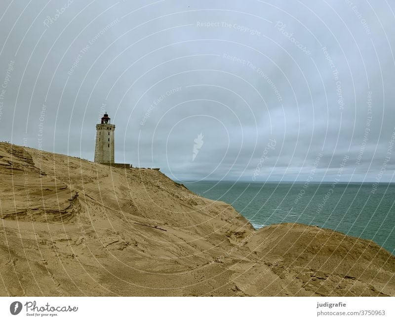 Lighthouse Rubjerg Knude Fyr still at its original place at the coast of Denmark Coast North Sea dune Vacation & Travel Colour photo Deserted Exterior shot Sand