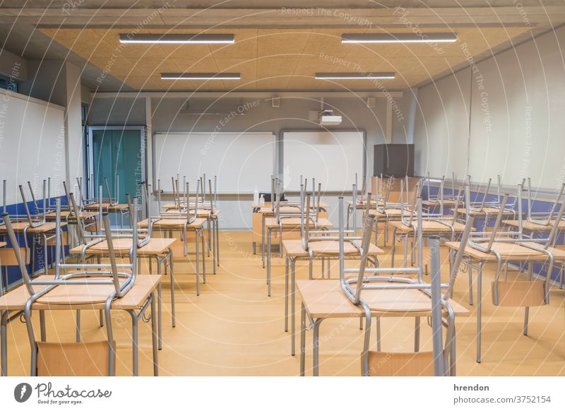 Empty school - due to corona virus COVID-19 education class back to school classroom elementary indoor desk primary knowledge learn pandemic safety educational