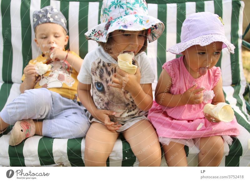 three children eating icecream Squint Looking away Upper body Portrait photograph Pattern Structures and shapes Abstract Experimental Detail Close-up