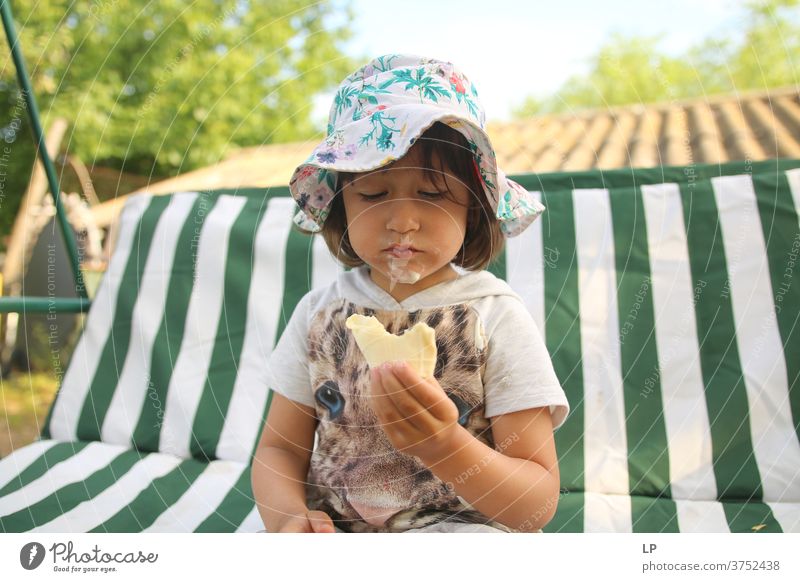 little girl holding an icecream Wonder dilemma Fresh Life Food Joy Teamwork Lifestyle real people Childhood memory Children's game Dairy Products health Healthy