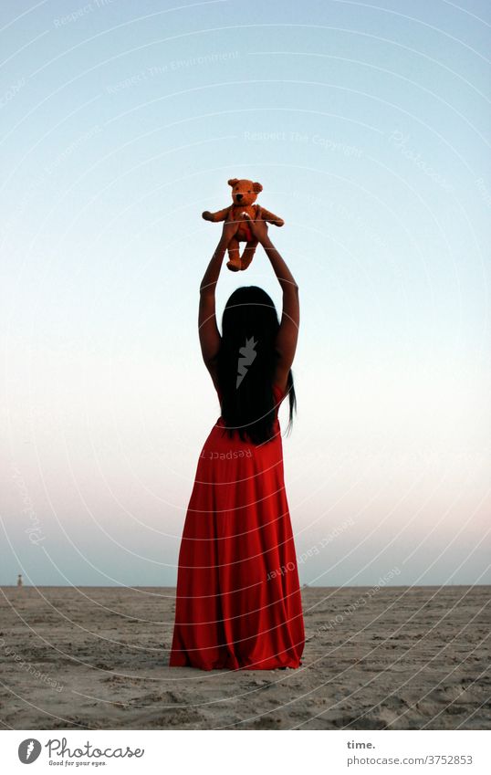 spirit in a material world Evening Moody Dark-haired Long-haired Dress Beach Sky North Sea Red Elegant feminine stop Woman teddy children's toy Horizon Sand