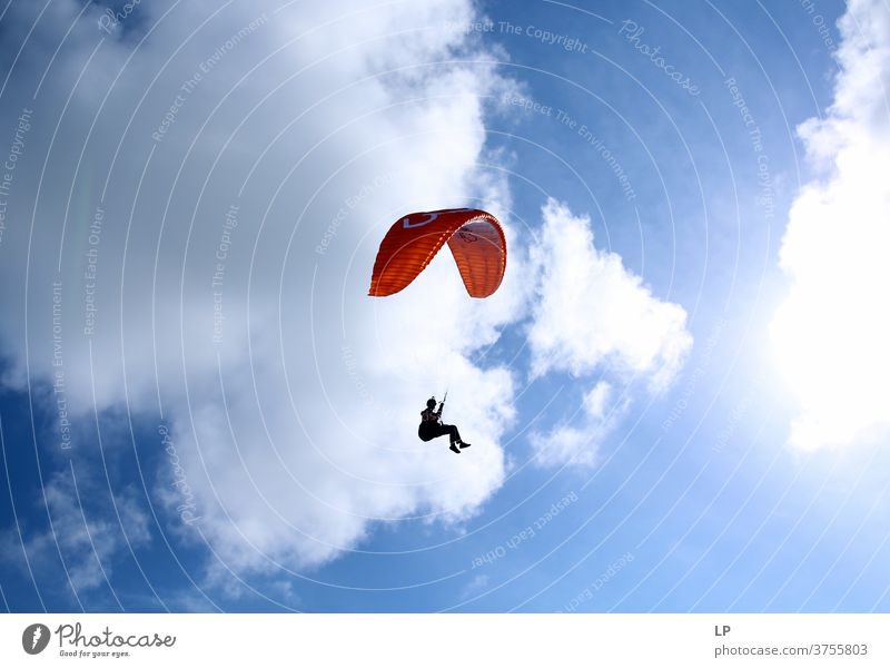 orange paraglide and paraglider in the air Paragliding Dream distance High-key High-rise Weight Air Exceptional Excitement Exciting fun hight awesome Stability