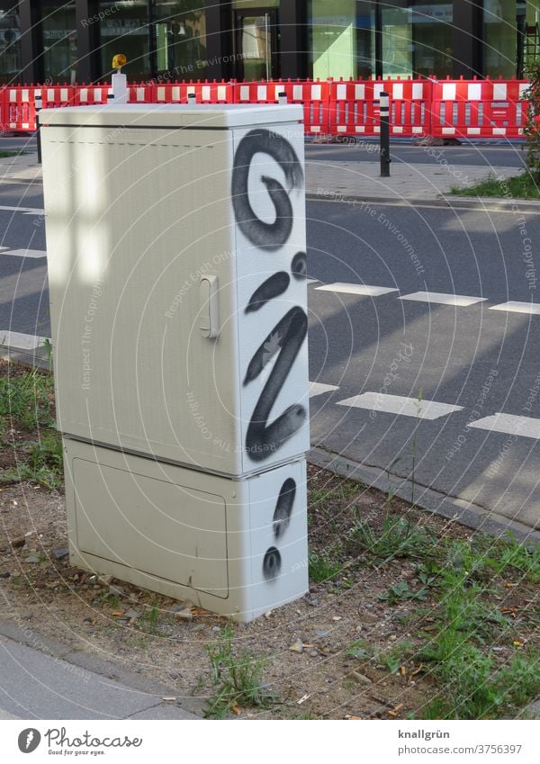 Graffiti "GIN!" on the side of a power distribution box in the city centre Town Street art Exterior shot Characters Letters (alphabet) Art Deserted Daub