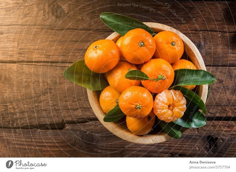 Delicious and beautiful mini Tangerines tangerine orange clementine mandarin citrus closeup ripe green healthy fresh sweet fruit organic juicy mandarine nature