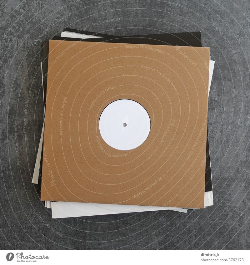 white label vinyl records in cardboard sleeves music blank pile promo covers mockup template background brown many audio album entertainment lp techno