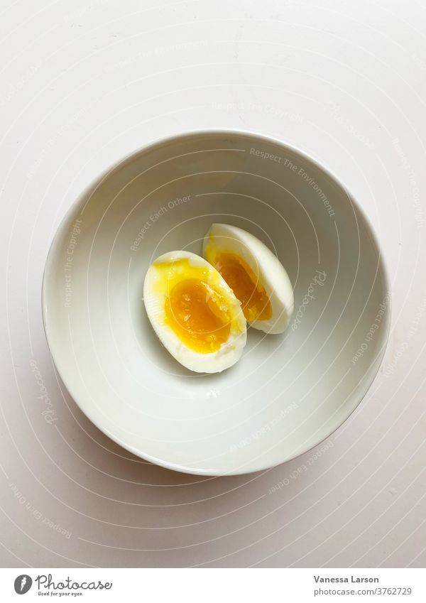 Soft Boiled Egg with Yellow Yolks in White Bowl boiled egg Food Breakfast Close-up Nutrition Protein Cooking healthy