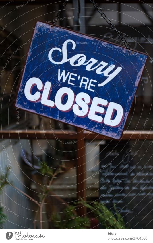 Sign, of a closed restaurant, in English. Closed unity closure too sorry Apology Signs and labeling sign Signage Characters Letters (alphabet) Typography Clue