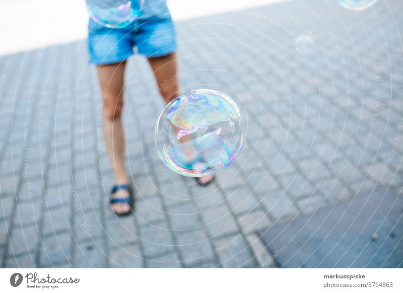 soap bubble away ball blow bubbles child circle clear clouds cloudy fly fun lucent mirroring optical reflection outside play playground playing puff reflexion