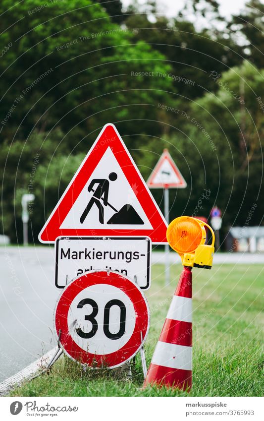 Road works Road marking Roadworks Construction site Clue Pylons 30 construction works Street Country road esteem Caution Sign forest