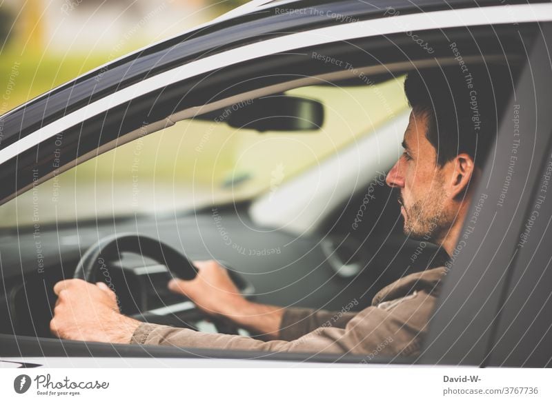 Man with the car on the road Motoring Car observantly Driving Concentrate tranquillity Self Control Serene Road traffic
