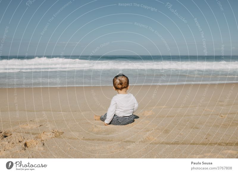 Toddler looking at the sea SEA Atlantic Ocean Beach Beach vacation Child Summer vacation Relaxation Sun Sand Waves Coast Vacation & Travel Water fall Autumn