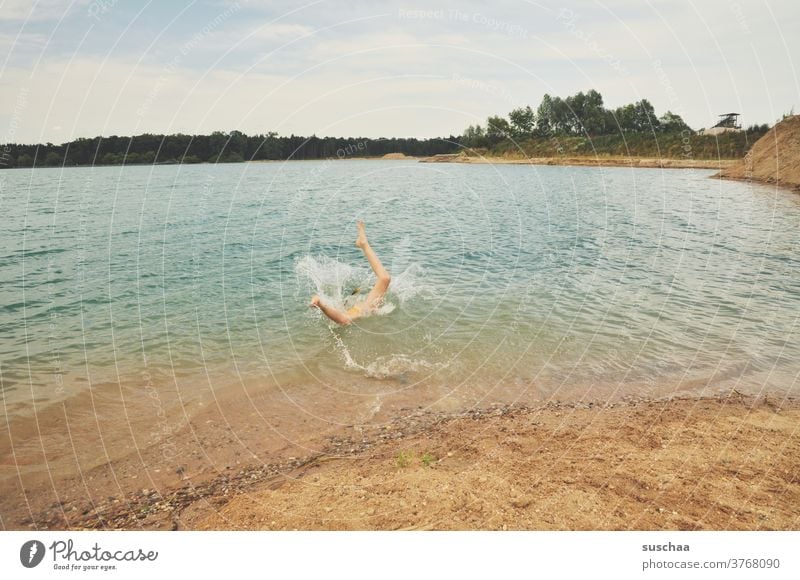 headfirst into the lake Swimming lake Summer vacation Holidays at home Child Infancy bathe Water jump Splash water Legs upside down Beach Swimming & Bathing