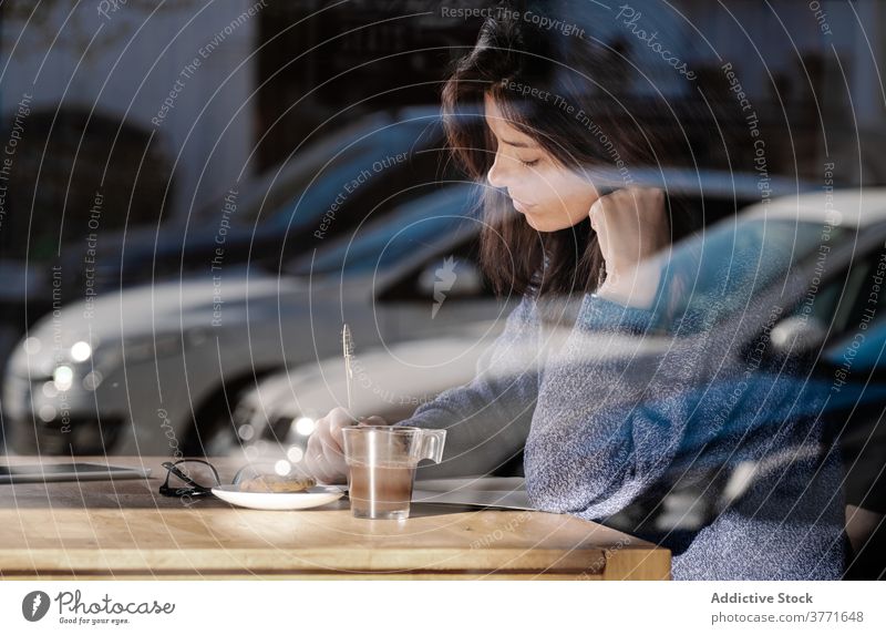 Thoughtful woman taking notes in notebook in cafe take note thoughtful morning cozy notepad planner write coffee female cup table pensive drink think beverage