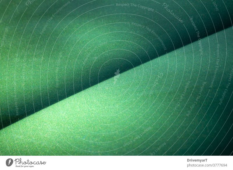 Green metallic shiny surface with a diagonal line background green texture Glittering Surface flaked Metal Graphic points Colour Considerations Art Abstract
