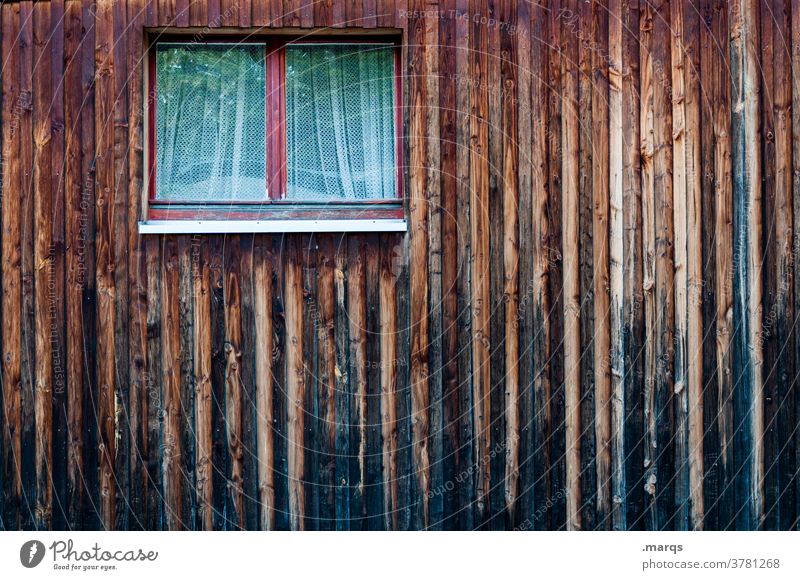 Window in wooden wall Wooden wall Curtain Facade Dark Brown Blue Hut Close-up