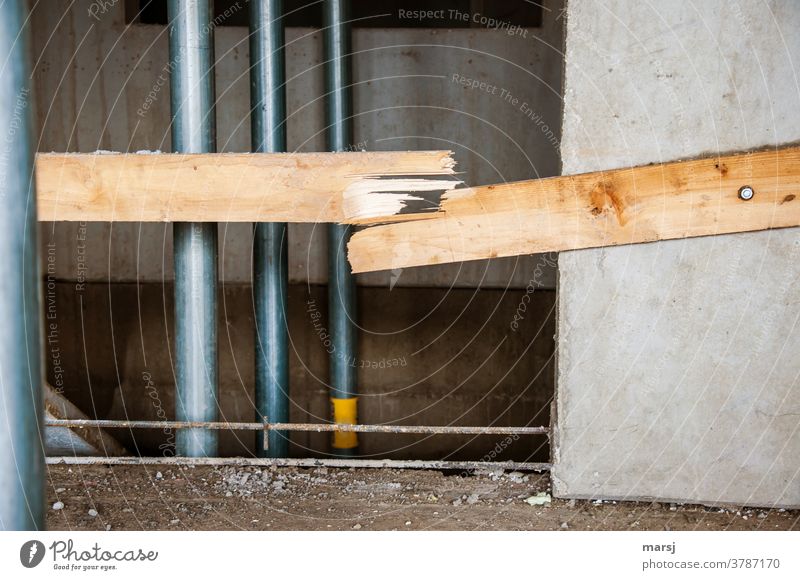 Broken wooden fall protection device, on a construction site Construction site Manmade structures Architecture Destruction subordinate Shaft support expansion