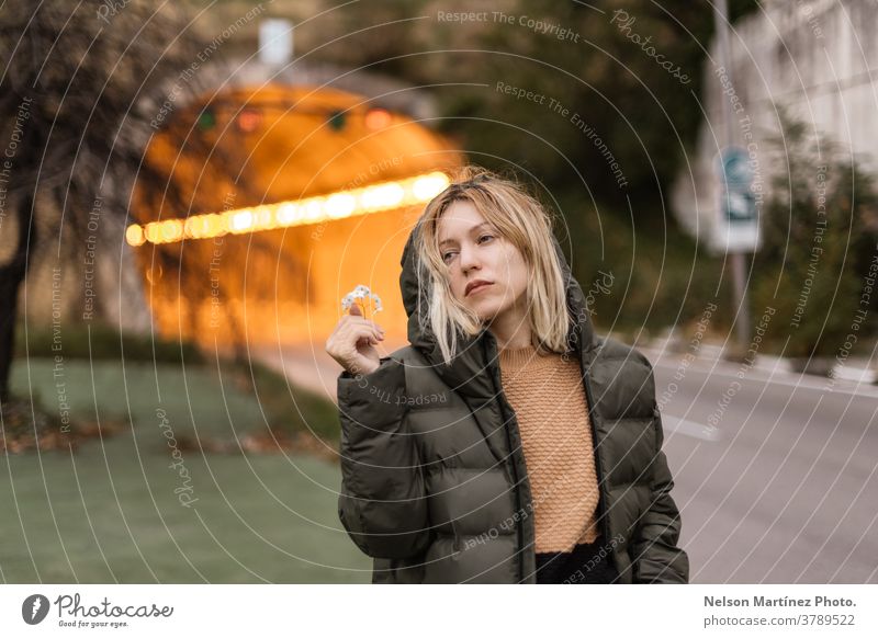 Portrait of a blonde woman autumn, with a tunnel in the background. portrait fashion Fashion Autumn Portrait photograph Exterior shot Woman Adults Street