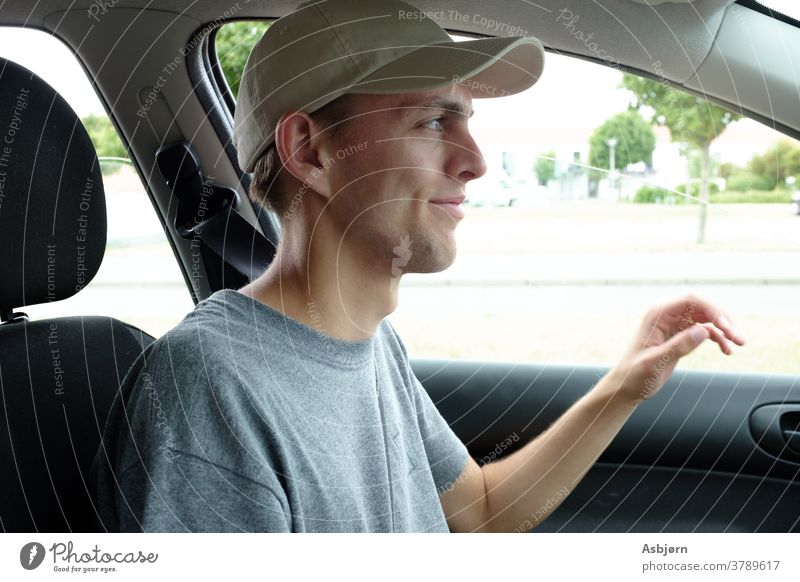 Happy man in a car happy outside driving Transport Vacation & Travel cheerful Calm Face Joy Vehicle summer green