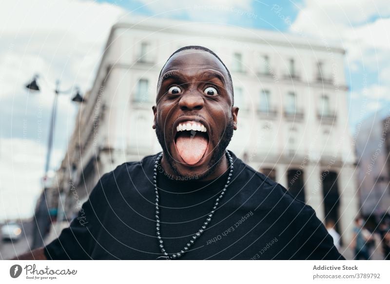 Portrait of funny black shouting at camera man male urban person portrait american adult african face people handsome young casual confident modern attractive