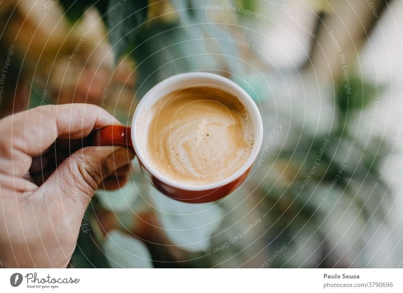Close up hand holding coffee cup Coffee Coffee break Coffee cup Espresso Table Colour photo Café To have a coffee Breakfast Hot drink Drinking Cup Beverage Food