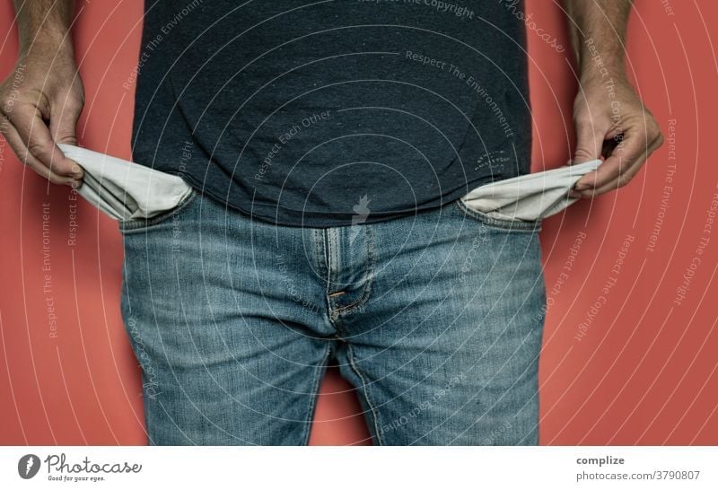 A man shows his empty pants pockets | money finance Man Poverty Paying Trouser pocket Empty Money banking trouser pockets Rent Loose change Burnt out