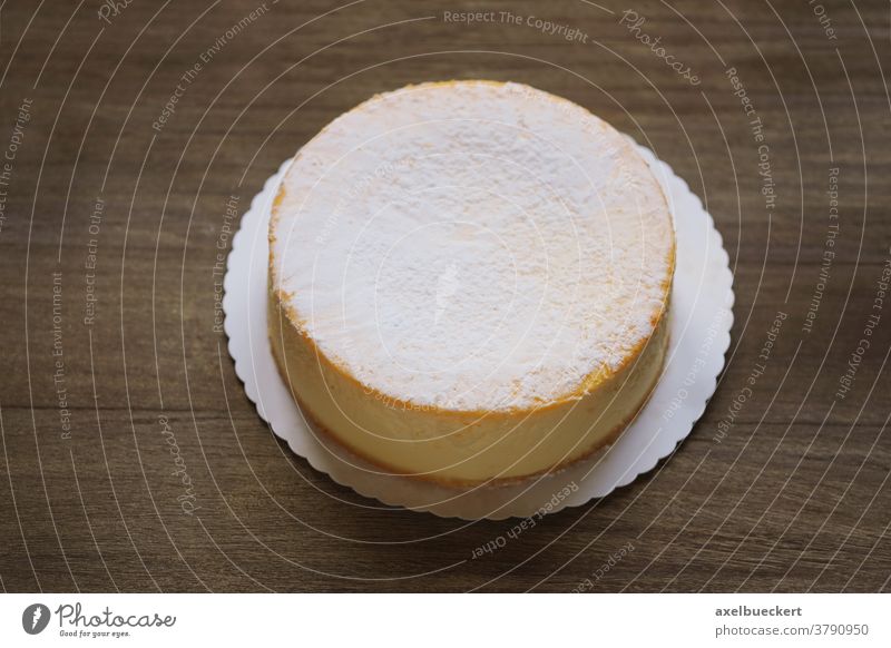 cheesecake or german cheese cream tart on rustic wooden table cheese cake food dessert torte pie whole homemade pastry gourmet sweet baked nobody bakery classic
