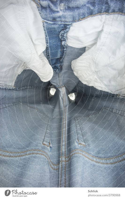 Empty jeans pants photographed from the inside Pants inboard trouser pockets Trouser leg socks Blue White Stand Pants zipper nobody textile garments Second-hand