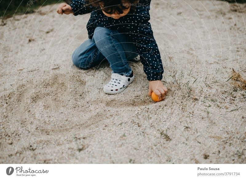 Child playing outdoors with sand Children's game childhood Caucasian Infancy Joy Colour photo Exterior shot Lifestyle Day Toddler Happiness Playing Human being