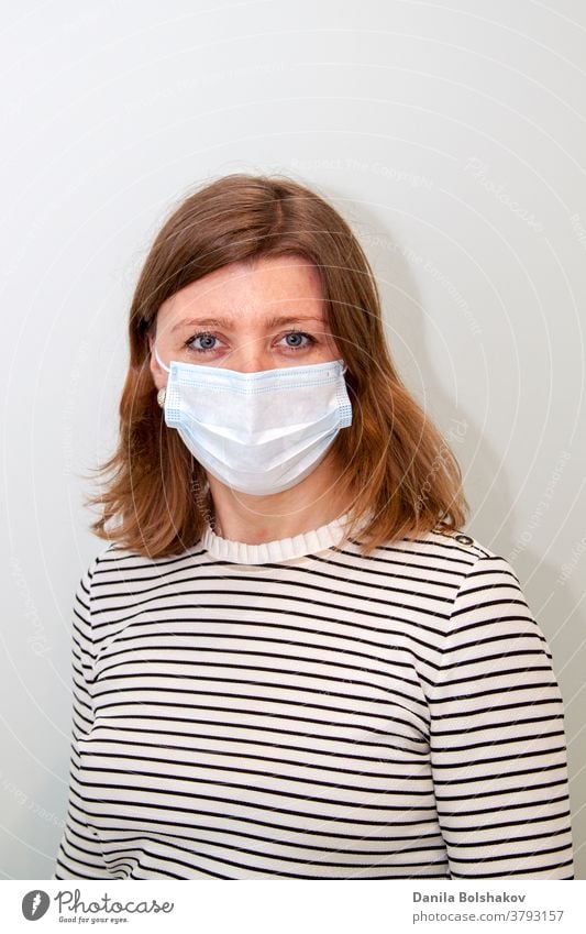 woman wearing an anti-virus protection mask to prevent flu infection, allergies, virus protection, COVID-19, and corona virus pandemic disease 2019 face doctor