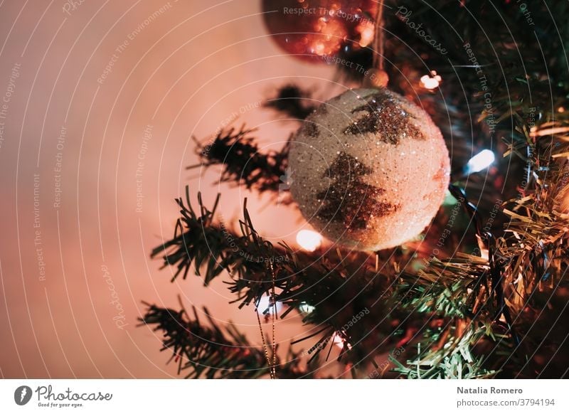 A Christmas ball is hanging on the Christmas tree. Christmas decoration. Close up. christmas decorative celebration merry christmas december