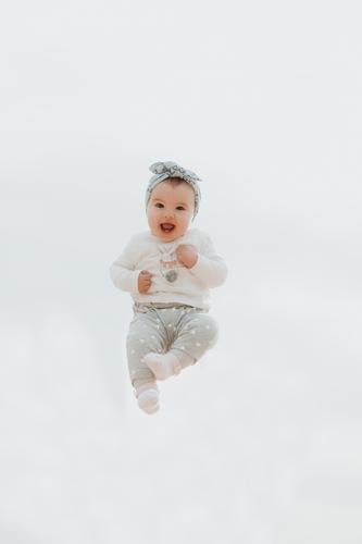 portrait of a child in the air. Beautiful smiling child concept helmet plane blue beautiful young kid caucasian people joy happy girl female childhood lifestyle