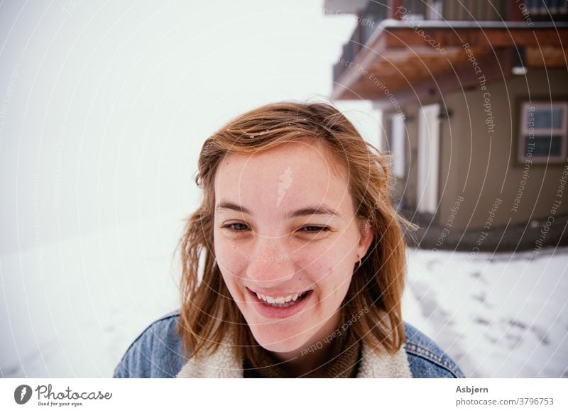 Woman in the snow play play in the snow Snow Cold ice frost winter snowday snowed in snowed over happy laughing White Ice Exterior shot horizontal outdoors