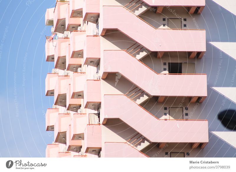 Pink colored apartment building in Bangkok City Thailand pink Apartment Building dwelling city bangkok city thailand urban High-rise Downtown Capital city