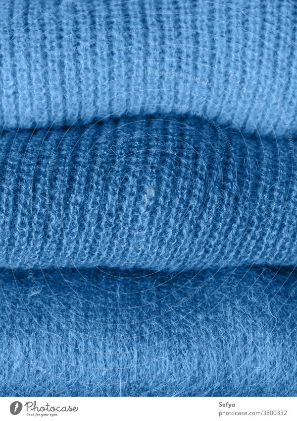 Pile of classic blue color woolen sweaters 2020 classical fashion yarn textile texture woman mohair background clothing phantom winter knit navy soft design