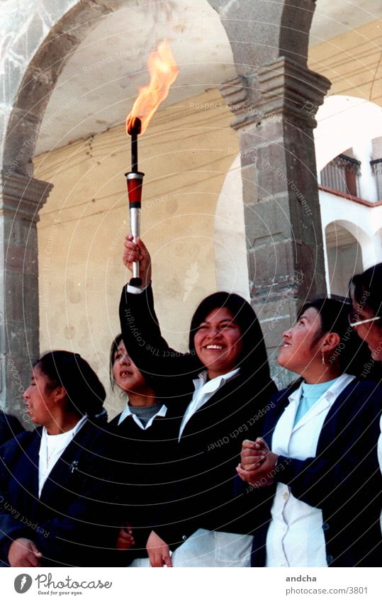 happy torchbearer Girl Schoolchild Uniform Human being Torch Fire Bolivia Laughter