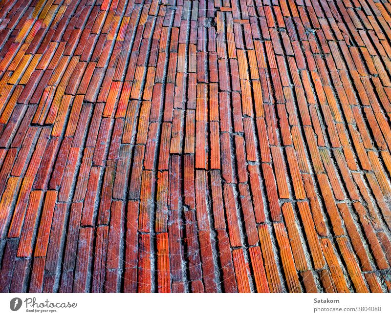 Texture of red brick floor and pathway earthenware walkway texture background pattern design abstract landscaping footpath outdoor pavement old shape line