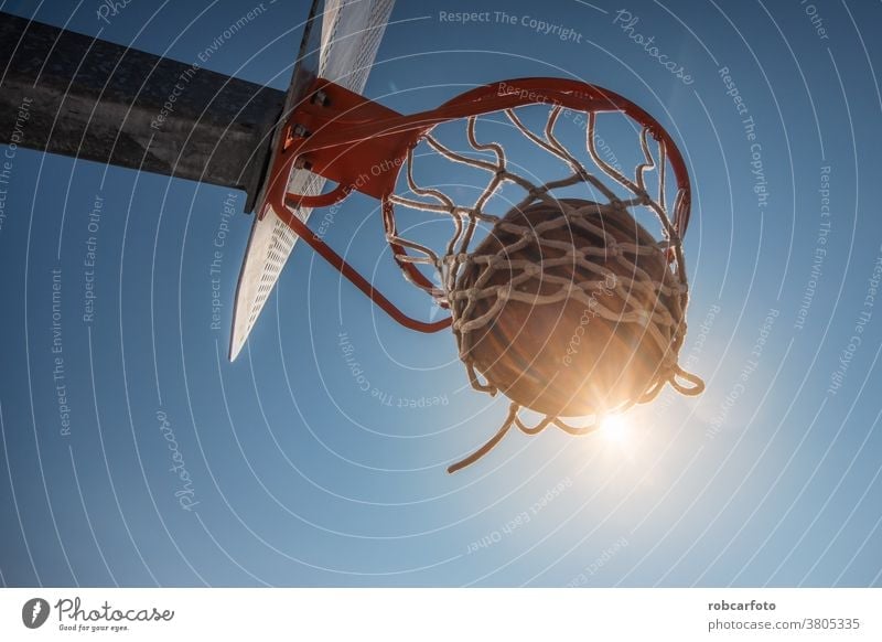 basketball an outdoor court on the street. fun sport urban people cool men shot young game male adult jump hoop score competition leisure african board fly one