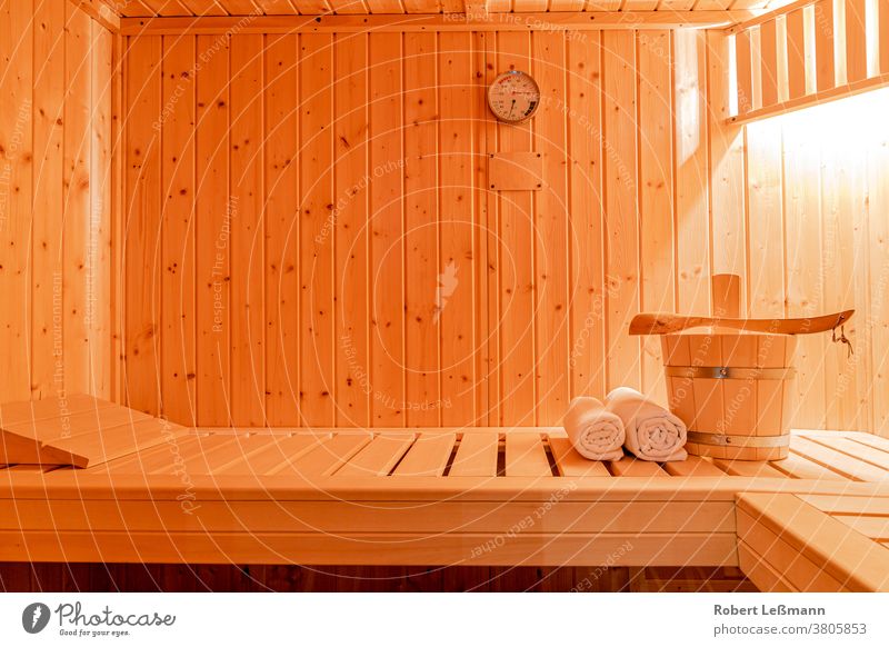 a small private sauna Sauna infusion Relaxation Wellness Bucket Towels ladle vacation Sauna Clima knife Thermometer hygrometer Copy Space relaxation ardor Wood