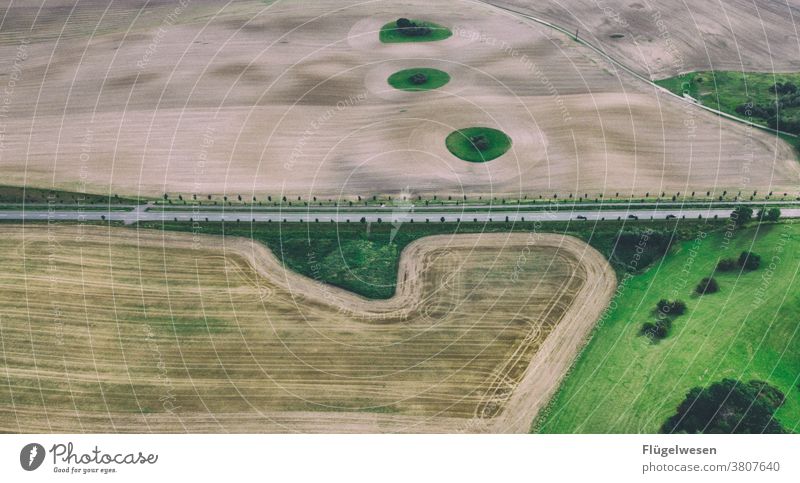 From above 4 Above aerial photograph drones droning UAV view Field Margin of a field Working in the fields Tracks Tracking track search Lanes & trails Grain
