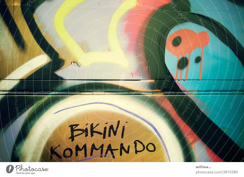 Bikini command Graffiti Command Bikini Commando variegated Characters Text Facade