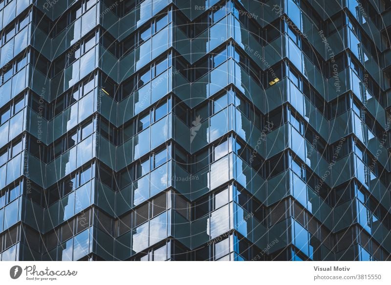 Geometric glazed facade of an office building architecture exterior structure construction windows urban metropolitan edifice geometric abstract design modern