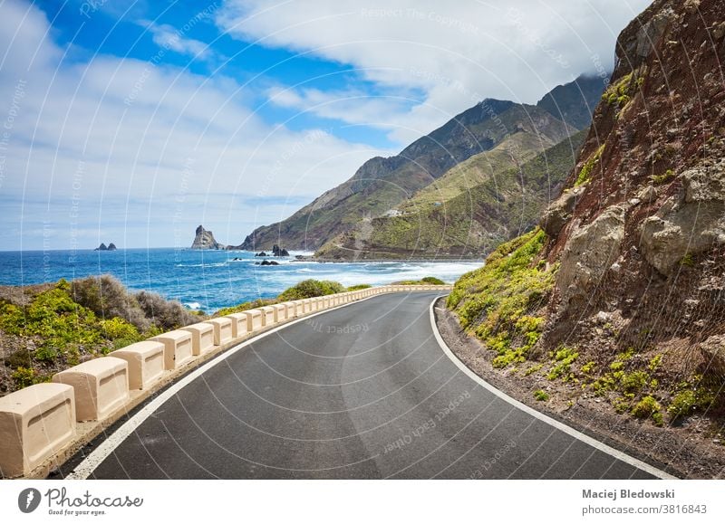 Scenic ocean road at the Macizo de Anaga mountain range, Tenerife, Spain. trip drive journey travel ocean drive vacation scenic scenery cliff Atlantic Ocean sea