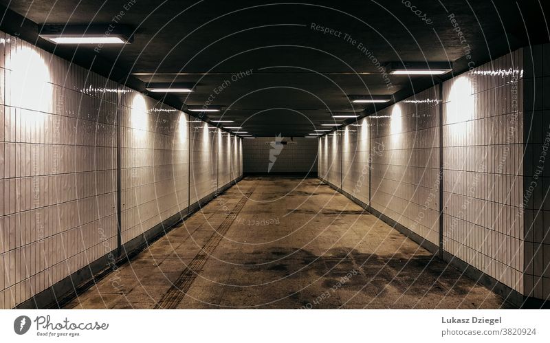 Underground passage at night underground Tunnel Underpass Architecture Lighting Neon light Tunnel vision Artificial light Corridor Shadow Empty Loneliness Tile
