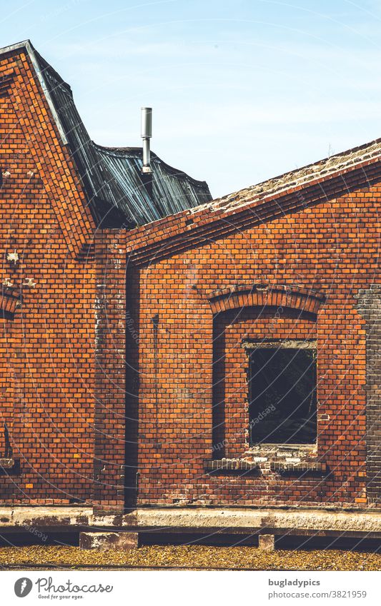 Old dilapidated brick factory building with sagging roof and missing windows Brick Brick facade Brick-built house brick wall Factory Brick building Facade
