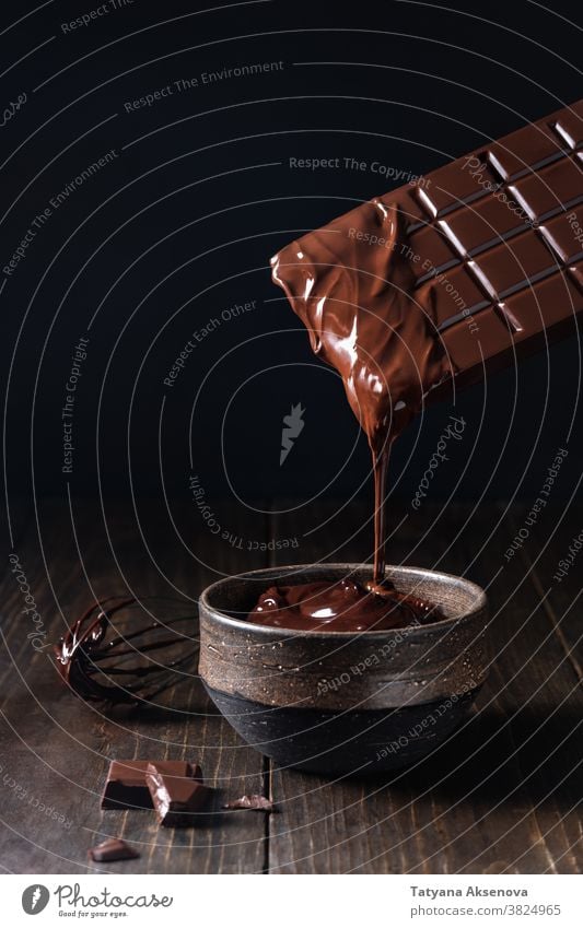 Dripping melted chocolate dark pouring hot texture dripping sweet cocoa food brown liquid ingredient dessert cooking creamy delicious tasty flowing confection