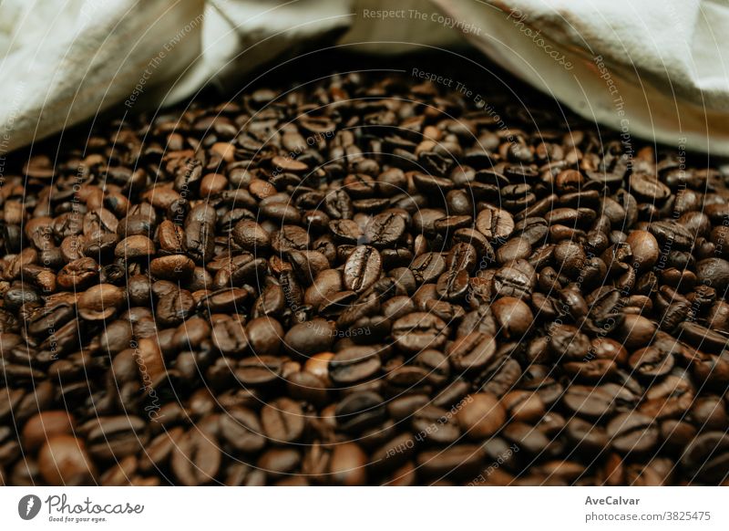 A colorful close up of a lot of coffee grains hot food caffeine roasted drink aroma mocha cafe espresso texture surface beverage cut space bean brown ingredient