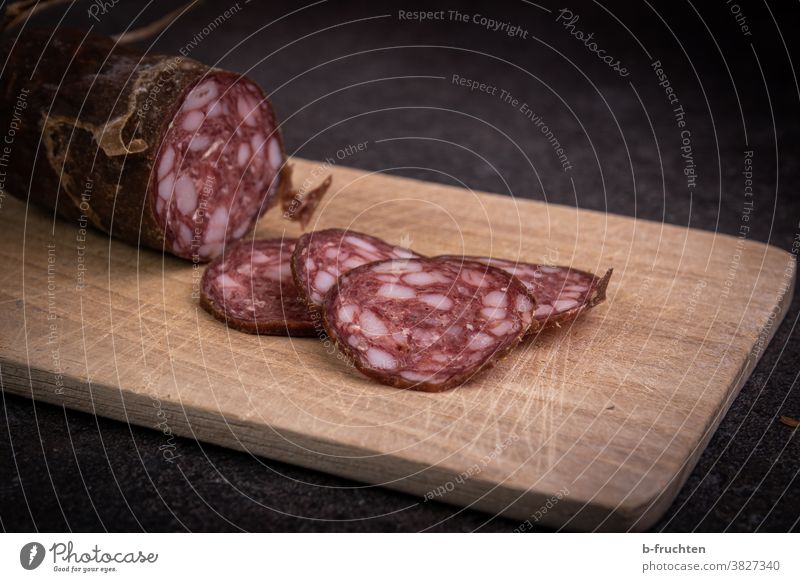 Sliced sausage, snack, snack time, salami Salami Sausage Food Nutrition Meat Dinner Delicious Eating Close-up Fat Chopping board Wooden board Unhealthy Appetite