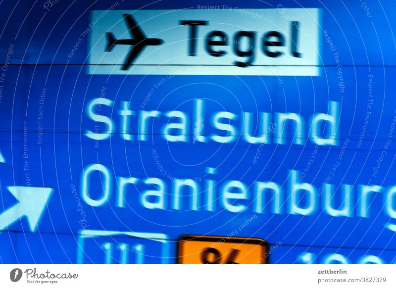 Signposts to Tegel, Stralsund and Oranienburg Turn off Highway Lane markings Clue edge Curve Left navi Navigation Orientation Arrow Right Direction Street tip