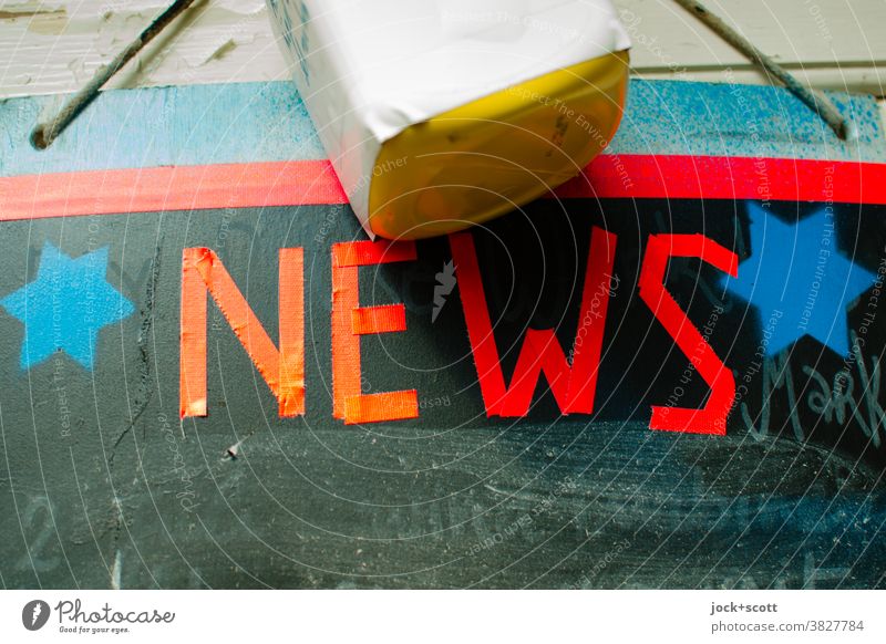 News for our chalkboard Blackboard Sponge Word News & Events Capital letter Typography stars English Signage Detail Adhesive tape adhesive letters Dirty smudged