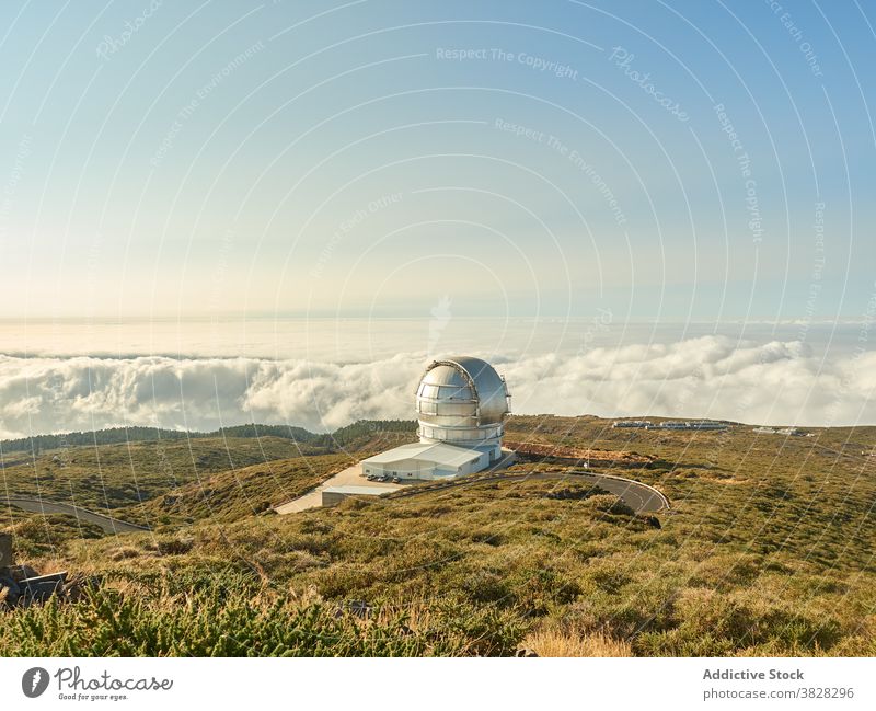 Telescope with dome on top of mountain observatory telescope optical reflect astronomy construction science astrophysic research system structure spain la palma